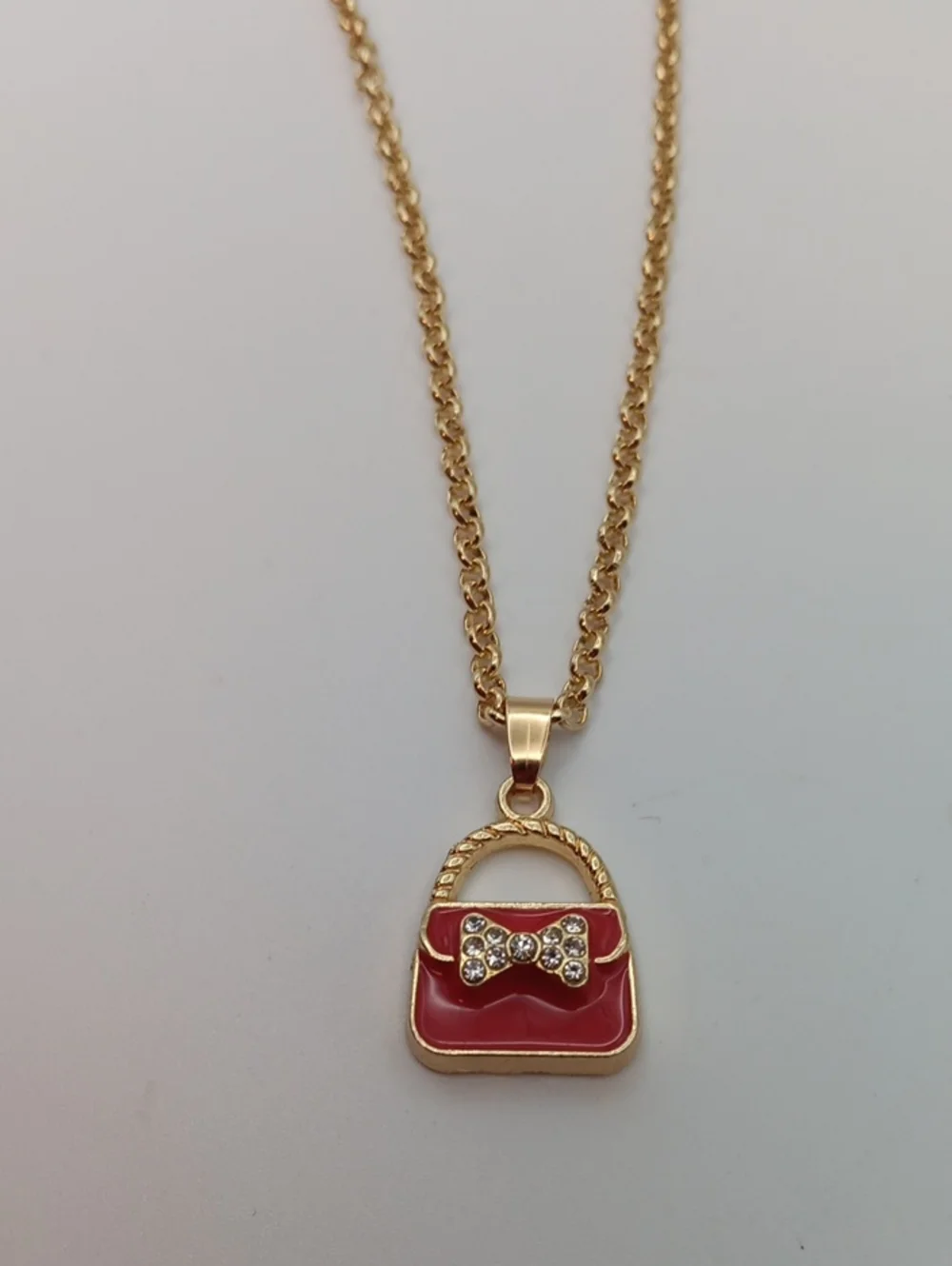 Gold-Tone Red Handbag Pendant Necklace and Earring Set
